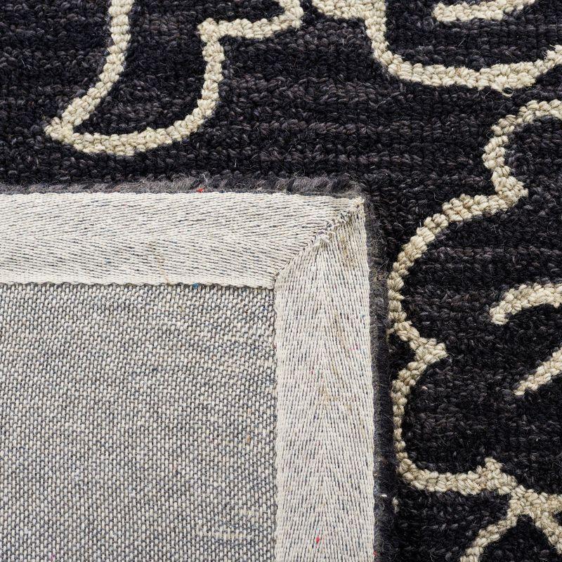 Jardin JAR602 Hand Tufted Area Rug - Black/Ivory - 8'x10' - Safavieh.