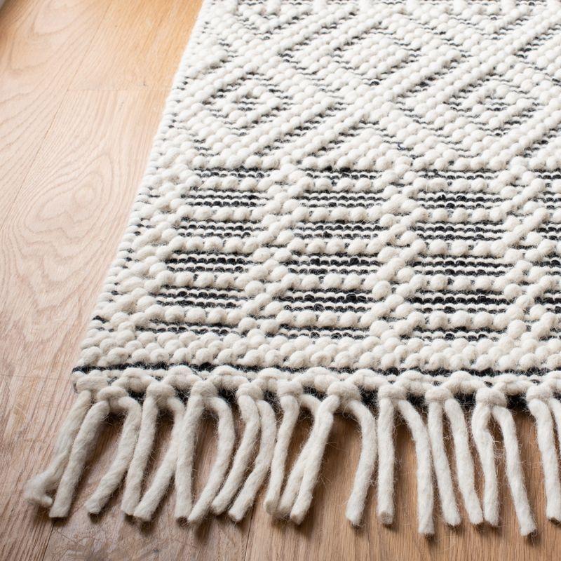 Ivory and Black Handwoven Wool Southwestern Rug