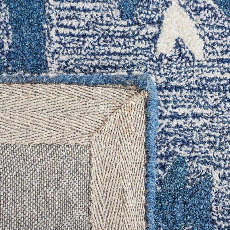 Ikat IKT652 Hand Tufted Area Rug - Blue/Ivory - 8'x10' - Safavieh.
