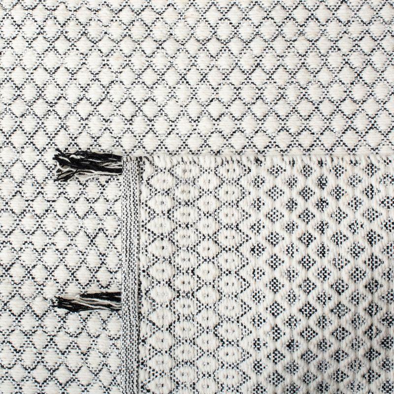 Montauk MTK813 Hand Woven Area Rug - Ivory/Black - 5'x8' - Safavieh.