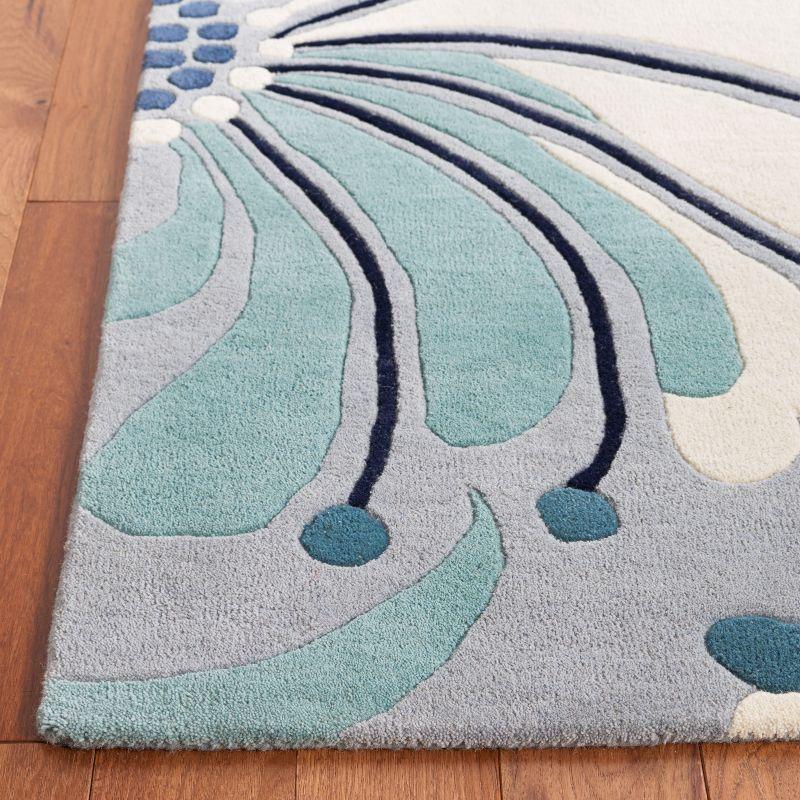 Soho SOH826 Hand Tufted Area Rug  - Safavieh