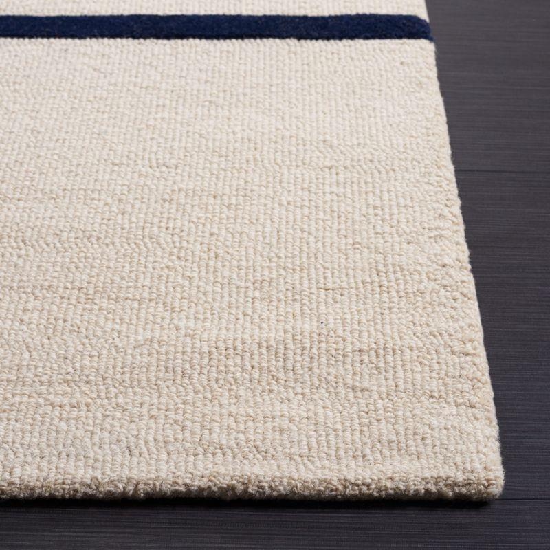 Rodeo Drive RD883 Hand Tufted Indoor Accent Rug - 4'x6' - Beige/Black - Safavieh