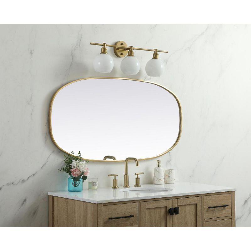Elegant Lighting Metal Frame Oval Mirror 24x48 Inch in Brass
