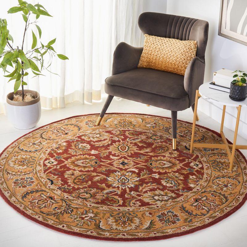 Hand-Tufted Round Red Wool Area Rug, 5' x 5'