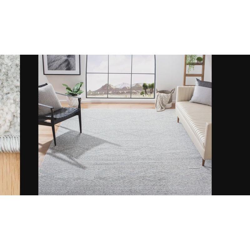 Ivory and Black Geometric Square Synthetic Area Rug