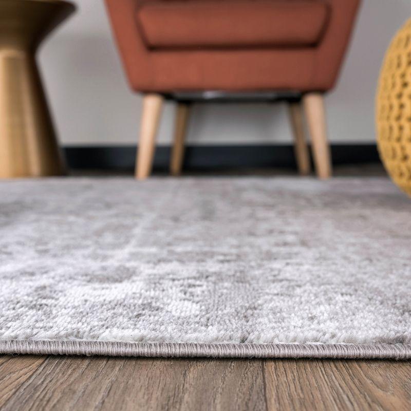 Reversible Distressed Abstract Gray 5' x 7' Synthetic Area Rug