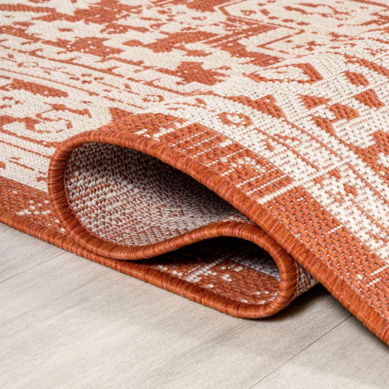 9' x 12' Sinjuri Medallion Textured Weave Indoor/Outdoor Area Rug, Orange/Cream - JONATHAN Y