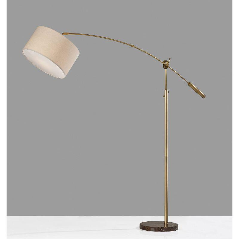 Adler Adjustable Arc Floor Lamp in Antique Brass with Cream Shade