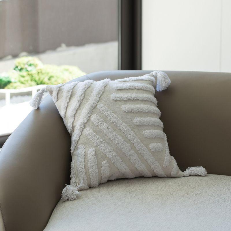 16" Boho Chic White Cotton Tufted Throw Pillow with Tassel Accents