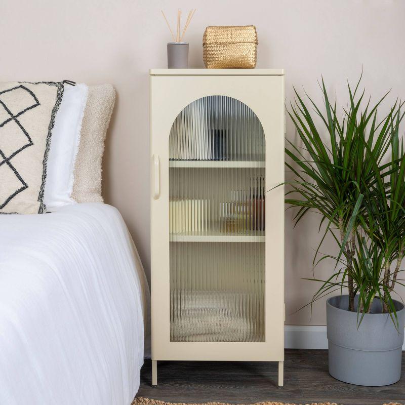 Storied Home Solstice Narrow Metal Accent Cabinet: Arched Glass, Off-White Display Storage