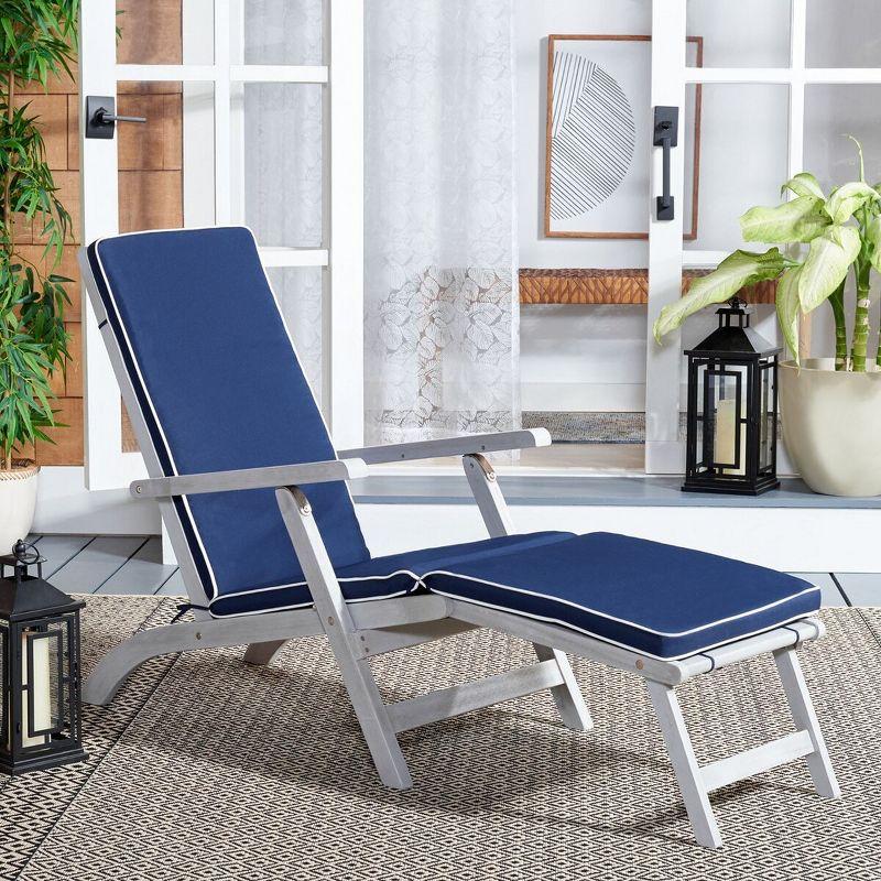 Elegant Oceanliner Inspired Acacia Wood Lounge Chair with Navy Cushion