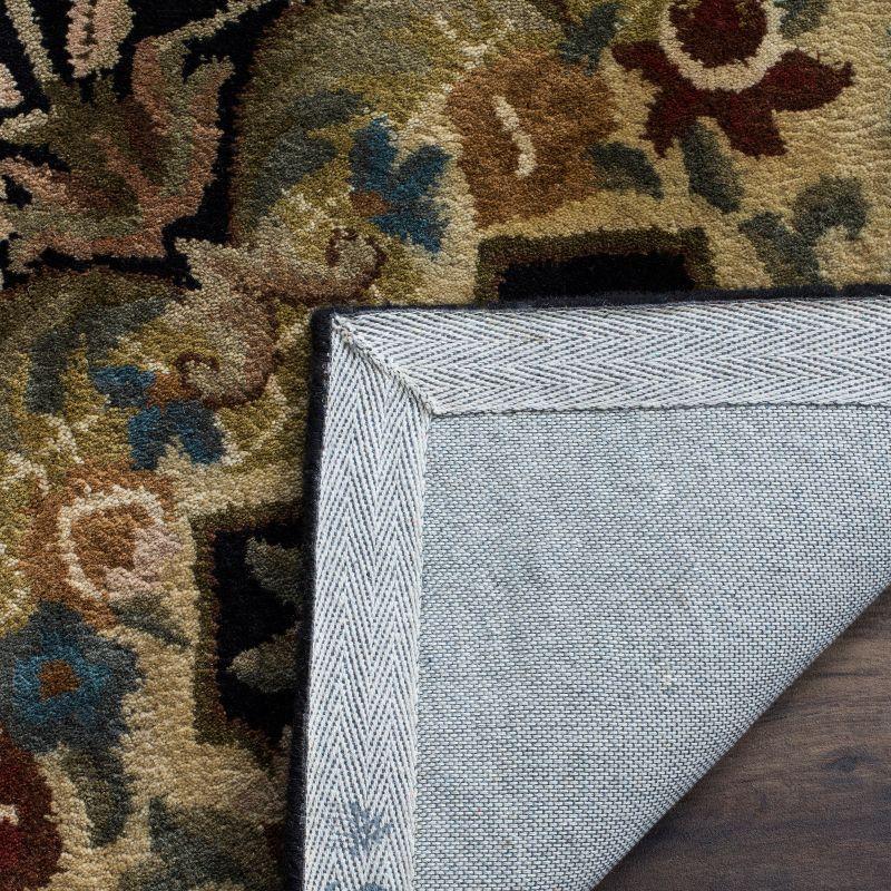 Classic CL304 Hand Tufted Area Rug - Black/Gold - 7'6"x9'6" - Safavieh.