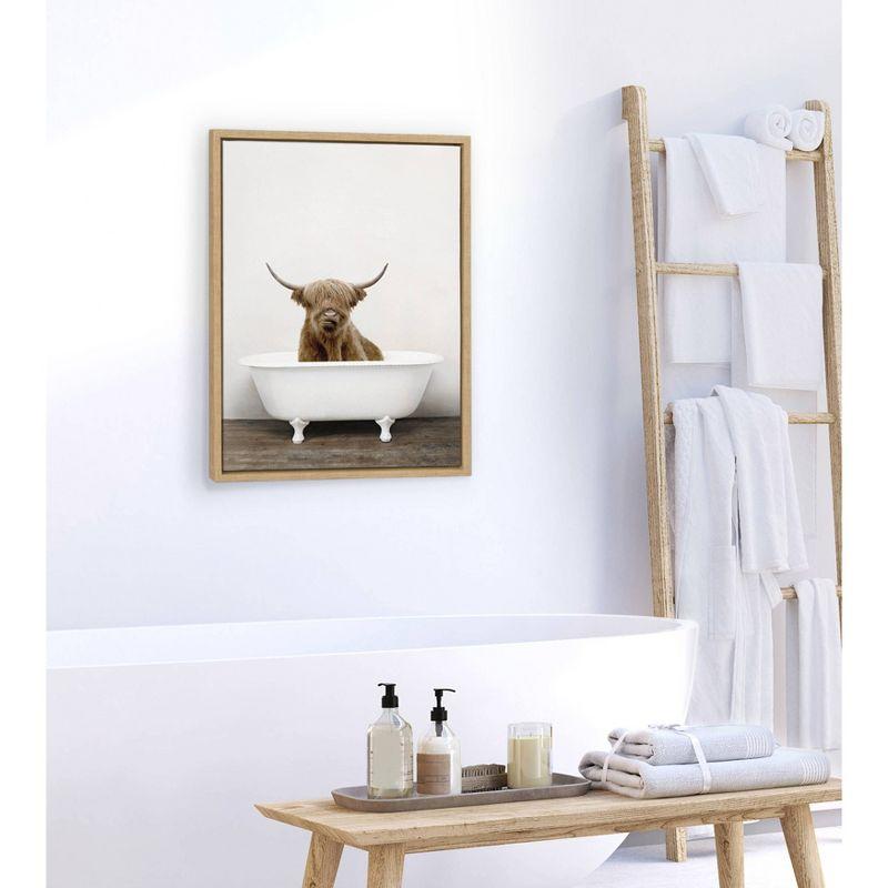 18" x 24" Sylvie Highland Cow in Tub Color Framed Canvas Wall Art by Amy Peterson Natural - Kate and Laurel