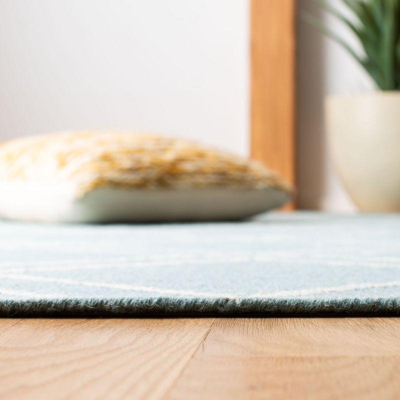 Dhurries DHU638 Hand Woven Area Rug - Light Blue/Ivory - 8'x10' - Safavieh.