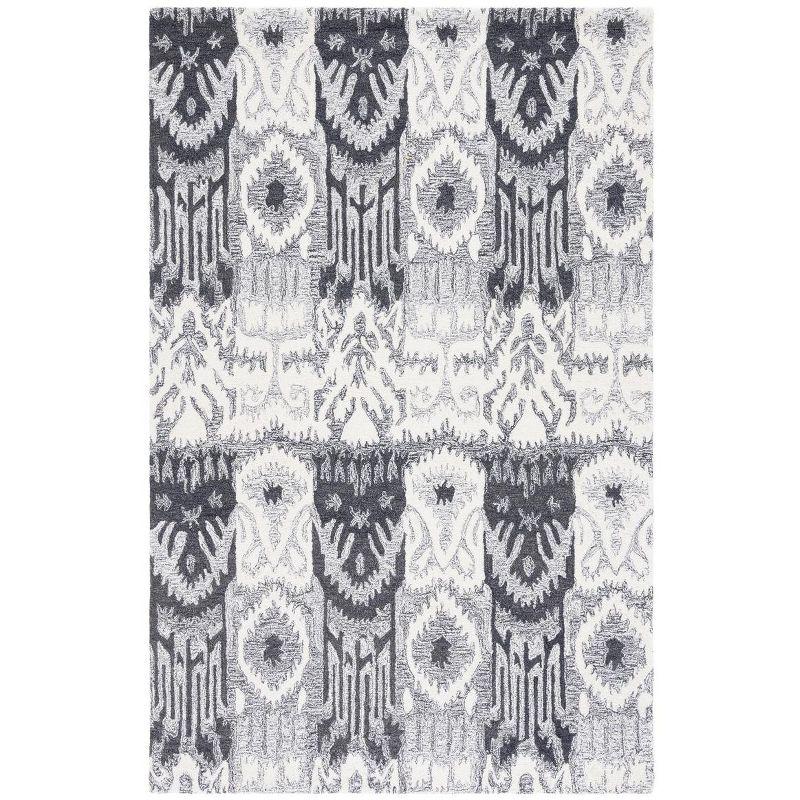 Ikat IKT653 Hand Tufted Area Rug - Ivory/Black - 5'x8' - Safavieh.