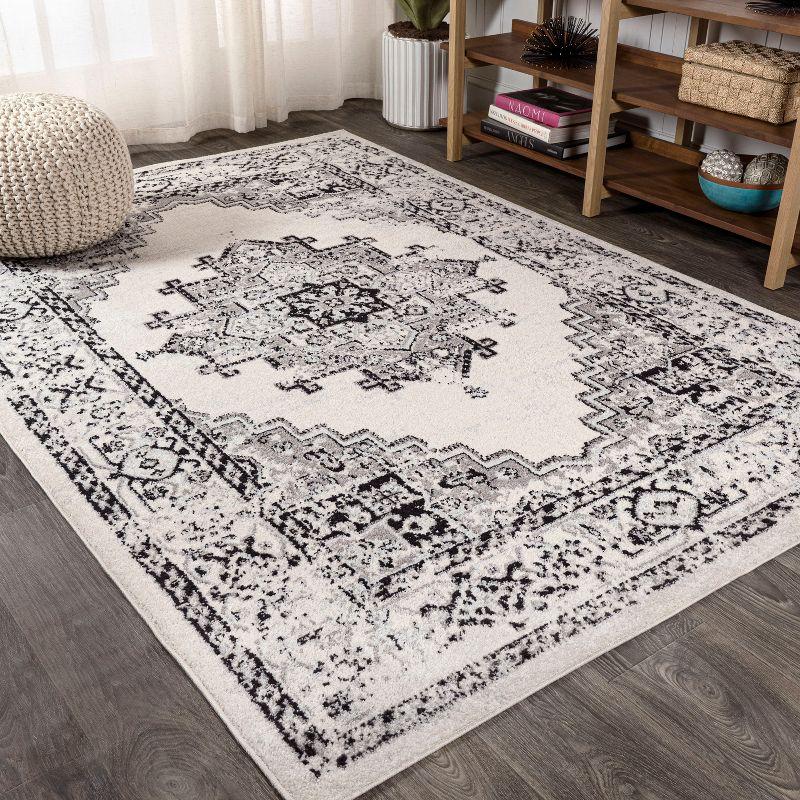 4' x 6' Dark Gray and Cream Medallion Synthetic Area Rug