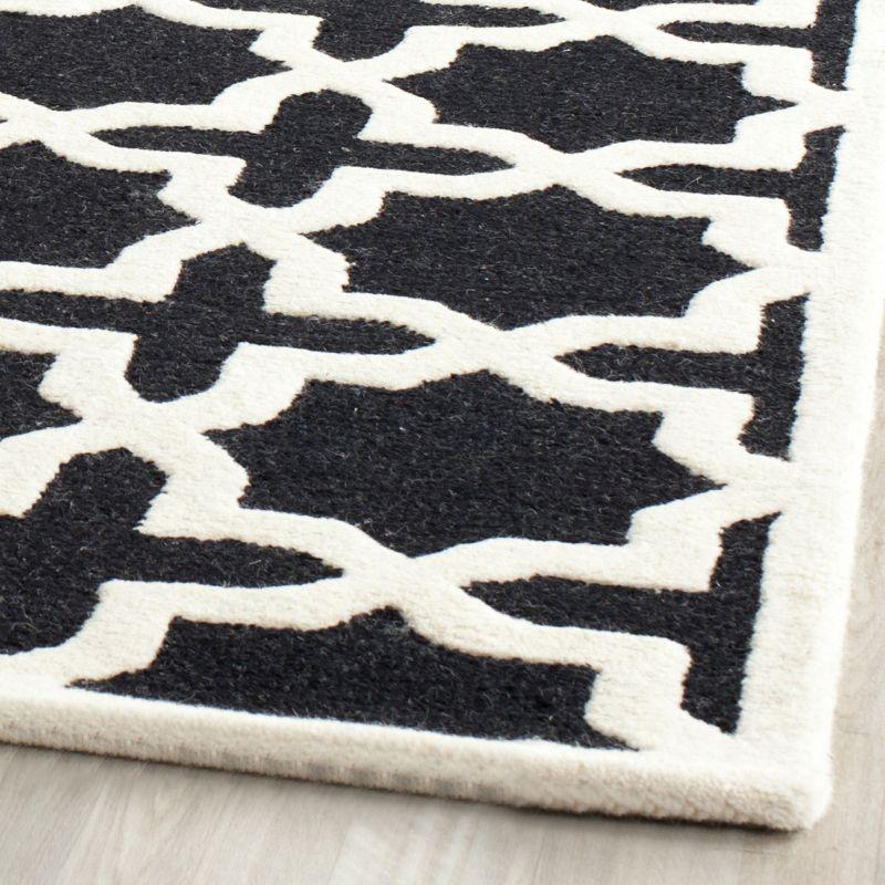 Cambridge CAM125 Tufted Indoor Area Rug - Black/Ivory - 4'x6' - Safavieh