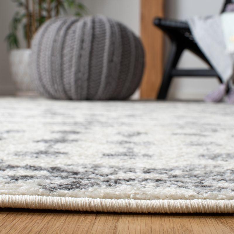 Ivory and Gray Geometric Square Synthetic Area Rug