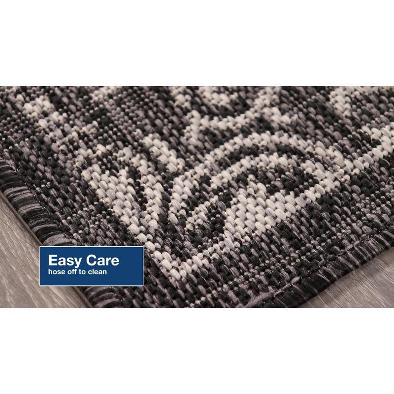 Carmel 24" Black Synthetic Flat Woven Floral Rug