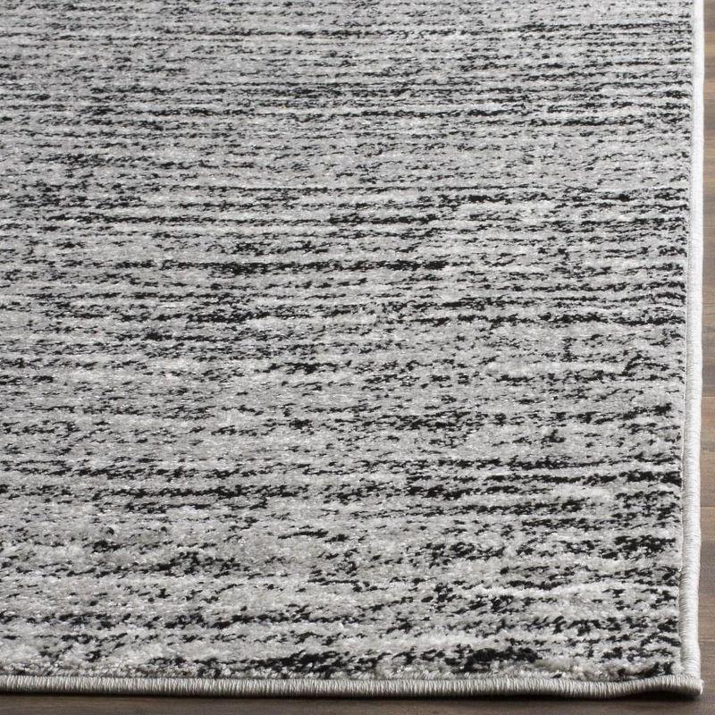 Reversible Black Stripe Synthetic 8' x 10' Rectangular Rug