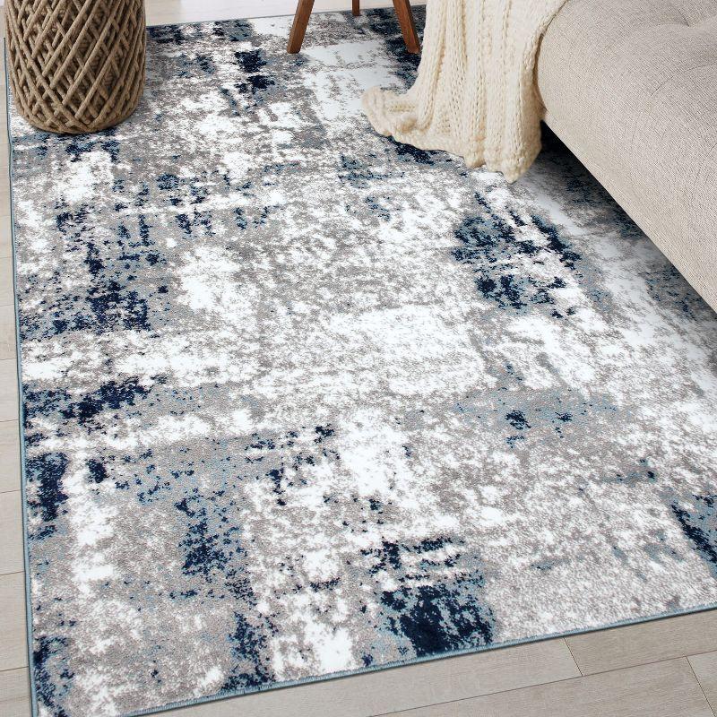 Reversible Blue Abstract Synthetic 5' x 7' Easy-Care Area Rug