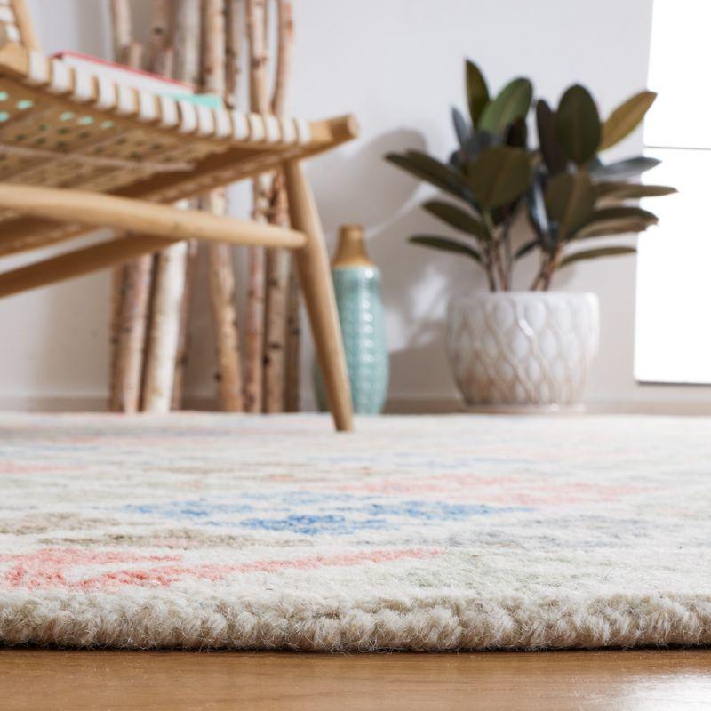 Ivory and Blue Hand-Tufted Wool Area Rug