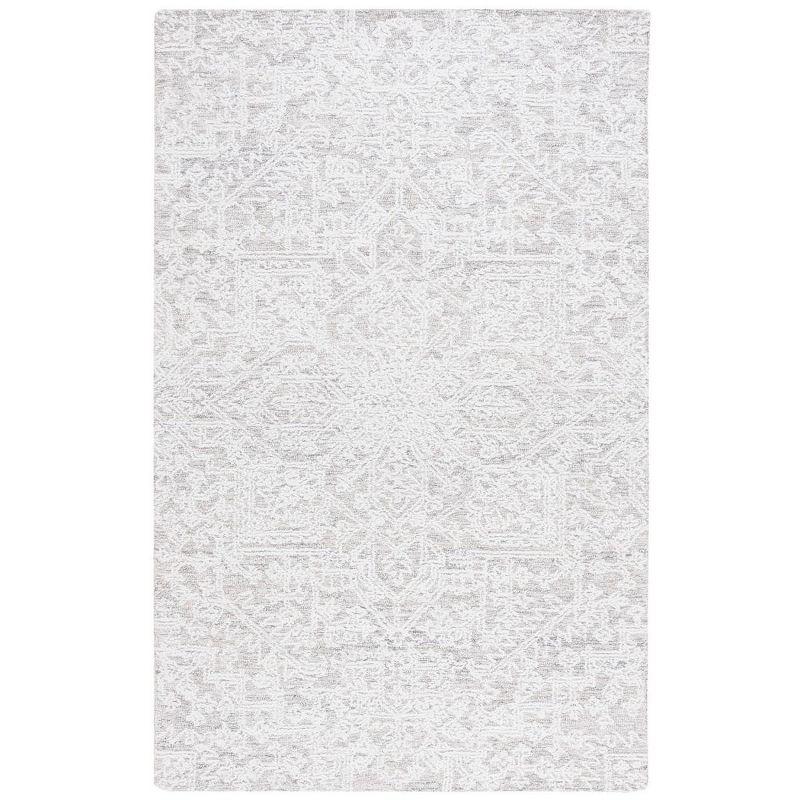 Ivory and Silver 8' x 10' Tufted Wool Area Rug