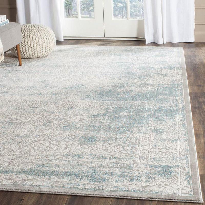 Elysian Ivory & Turquoise 9' x 12' Synthetic Reversible Area Rug