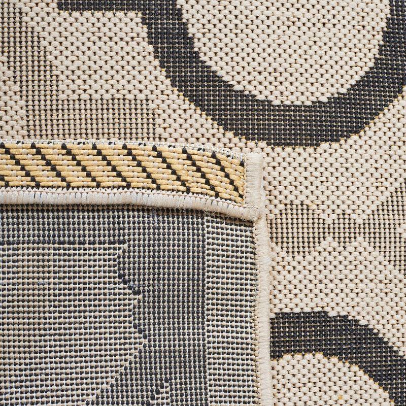 Beige and Black Geometric Outdoor Area Rug