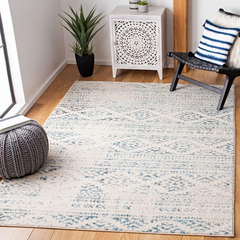 Ivory and Turquoise Geometric Hand-knotted Synthetic Area Rug