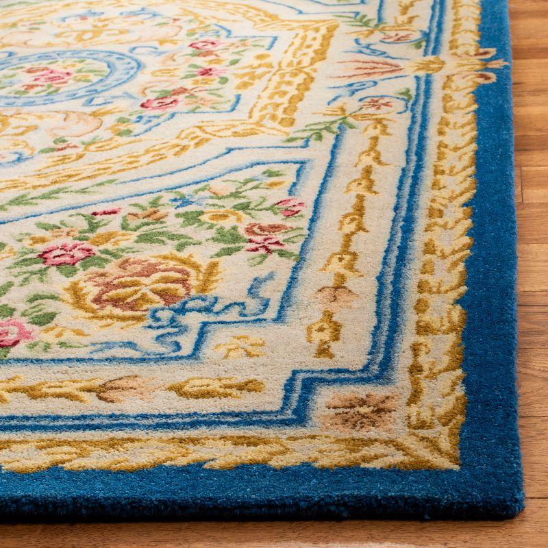 Handmade Blue Wool 9' x 12' Tufted Area Rug