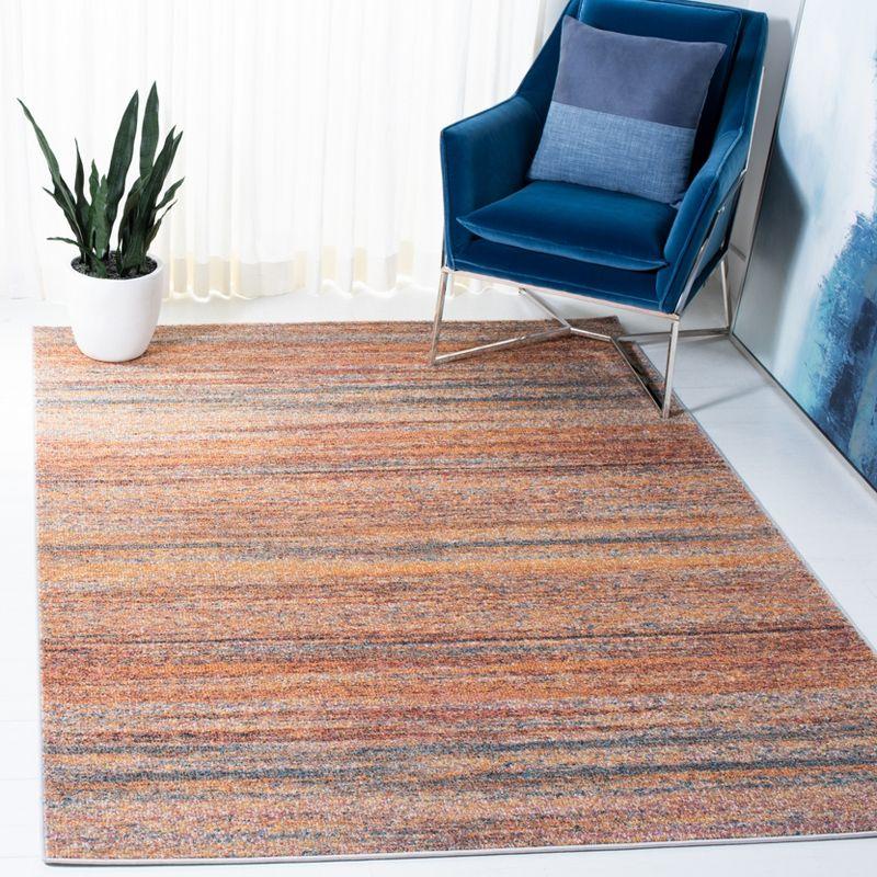 Rust and Blue Abstract Rectangular Synthetic Area Rug