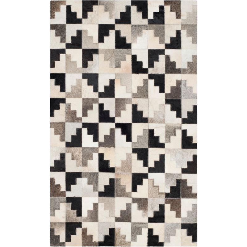 Handmade Black and Ivory Geometric Cowhide Area Rug, 3' x 5'