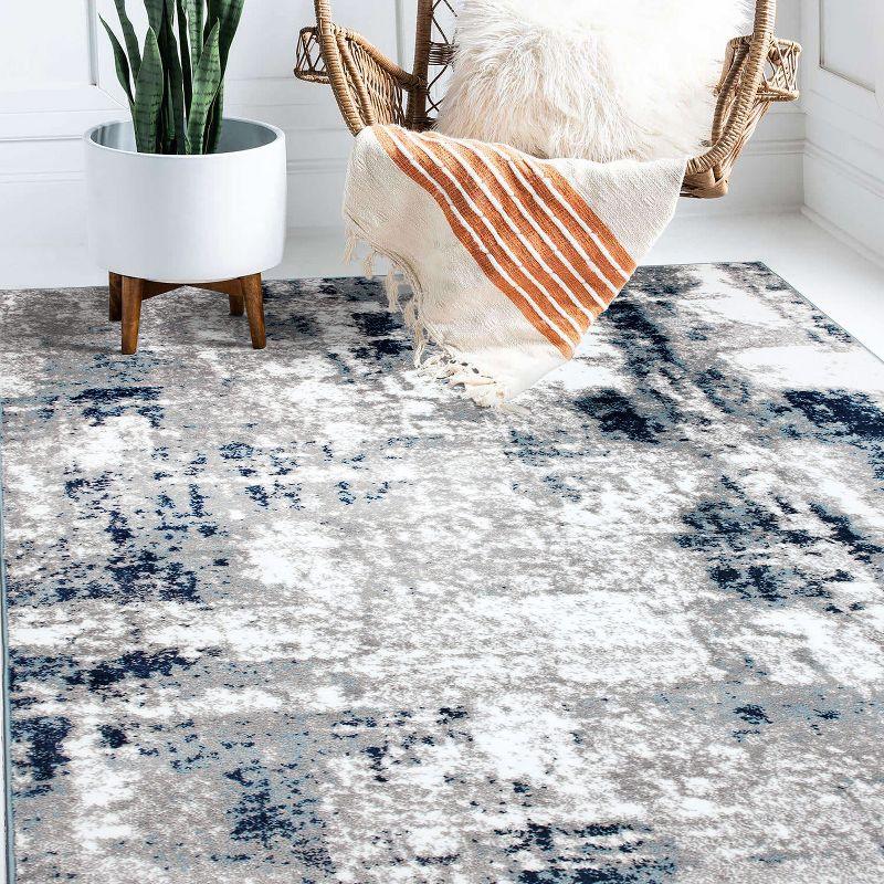 Reversible Blue Abstract Synthetic 5' x 7' Easy-Care Area Rug