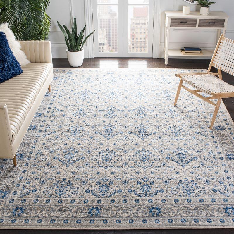 Ivory and Blue Hand-knotted Rectangular Synthetic Rug