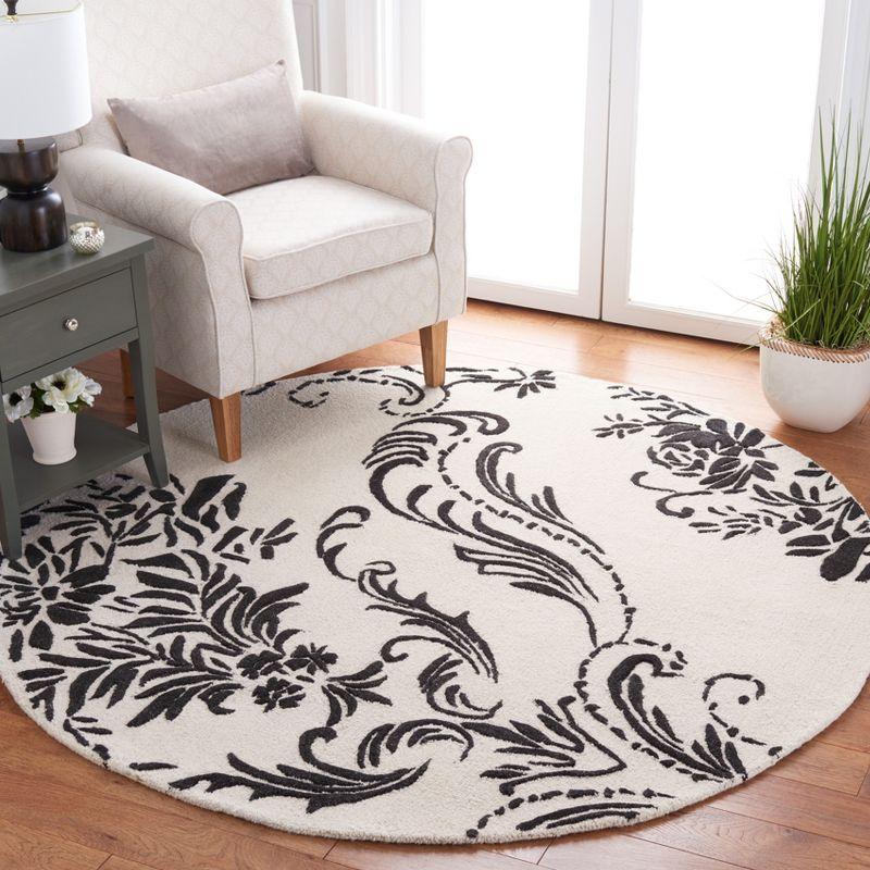 Ivory and Black Floral Hand-Tufted Wool Round Rug