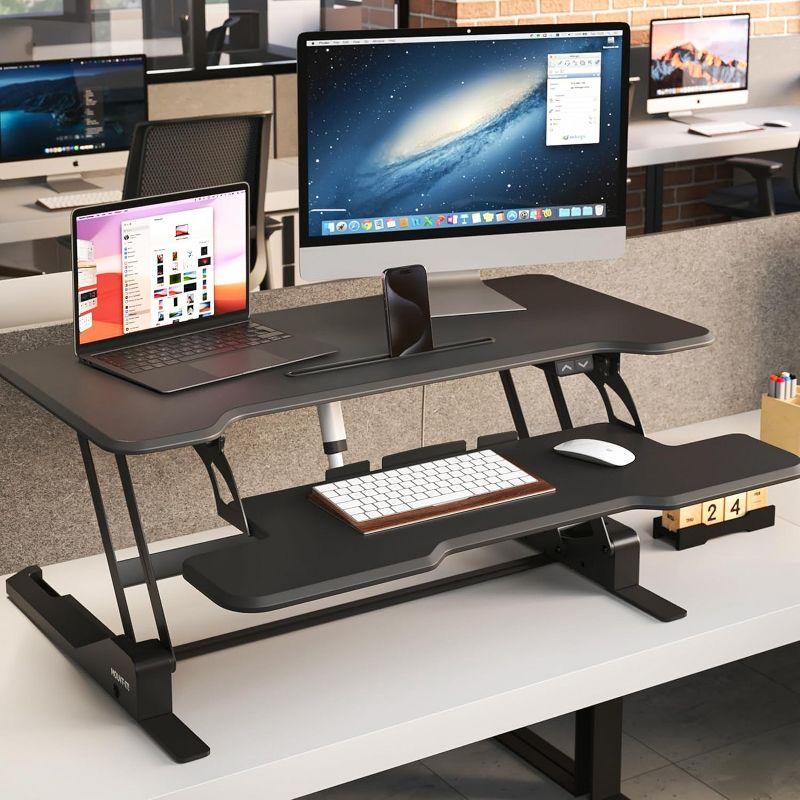 Mount-It! Electric Adjustable Stand Up Desk Converter | 38 in. Wide Tabletop Motorized Standing Desk Riser w/ Keyboard Tray Fits Monitors | Black