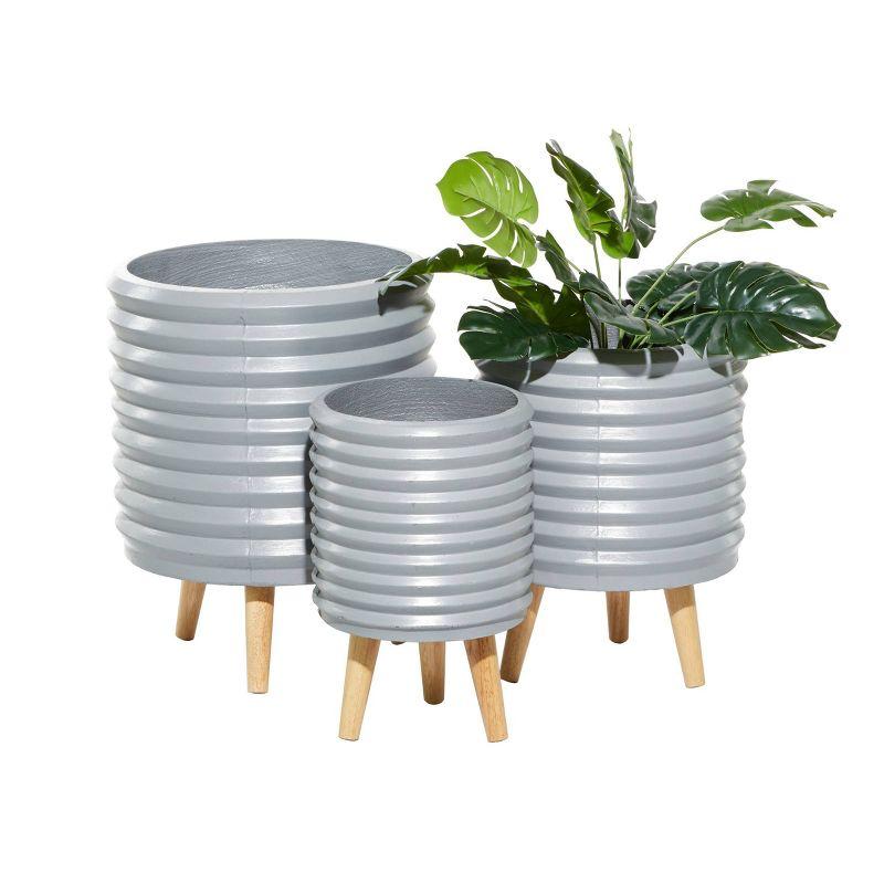 Cosmoliving By Cosmopolitan Set Of 3 White Wood Planter 14", 16", 18"H