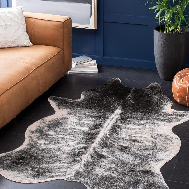 Handmade Black and Beige Faux Cowhide Rectangular Rug, 6' x 8'