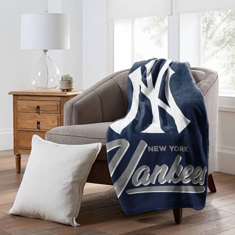 MLB New York Yankees 50 x 60 Raschel Throw Blanket