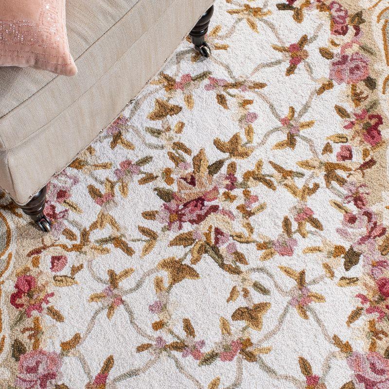 Chelsea HK73 Handmade Area Rug - 6'x9' - Ivory/Burgundy - Safavieh