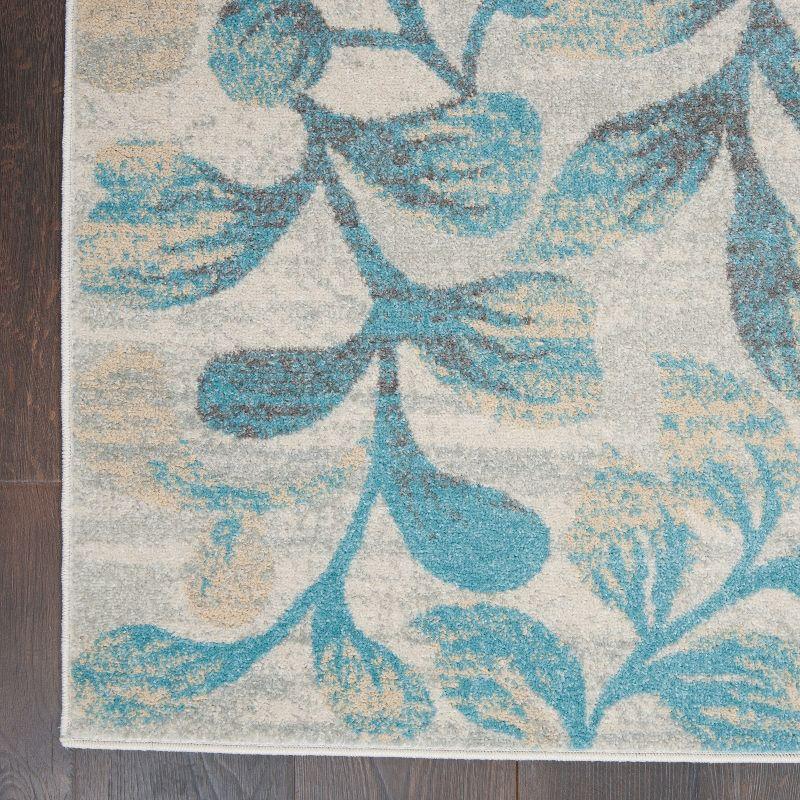 Ivory and Turquoise Floral Synthetic 4' x 6' Area Rug