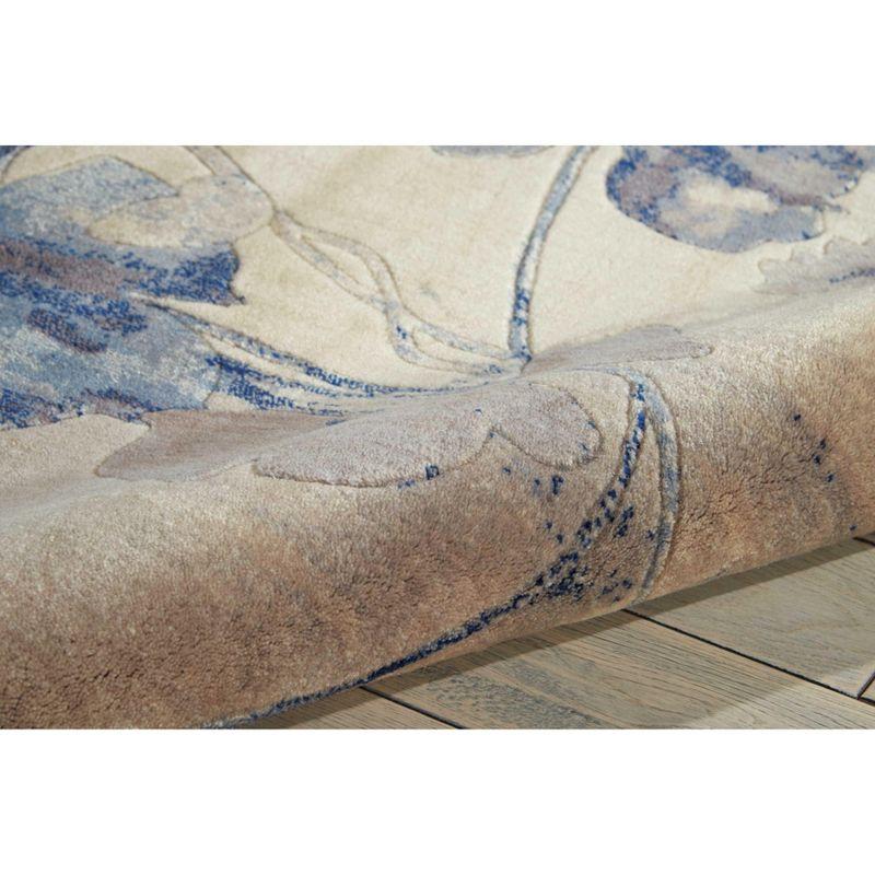 Ivory and Blue Floral Synthetic Rectangular Rug 9'6" x 13'