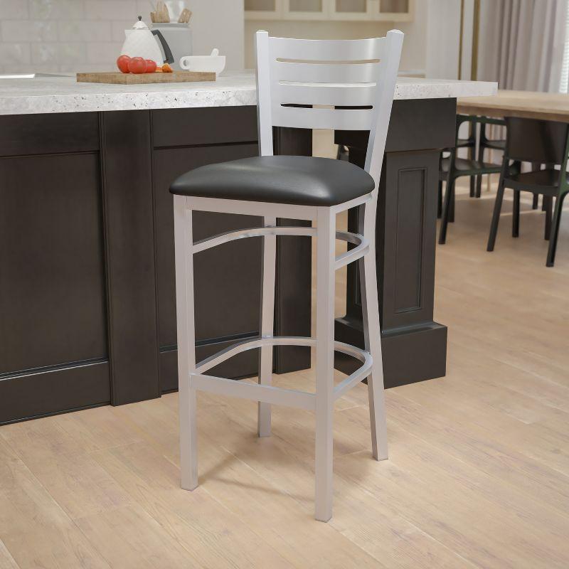 Sleek Silver Slat-Back Barstool with Black Vinyl Seat