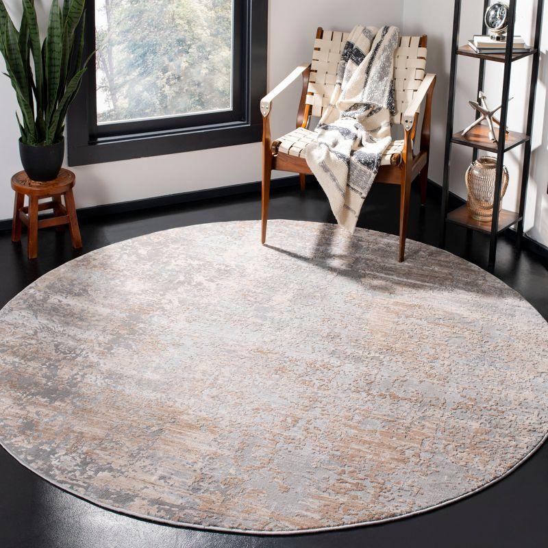 Beige and Gray Round Abstract Synthetic Area Rug