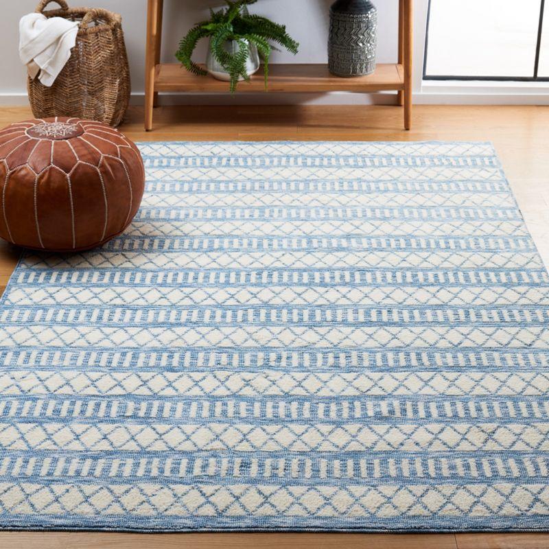 Ivory and Blue Washable Synthetic Area Rug, 3' x 5'