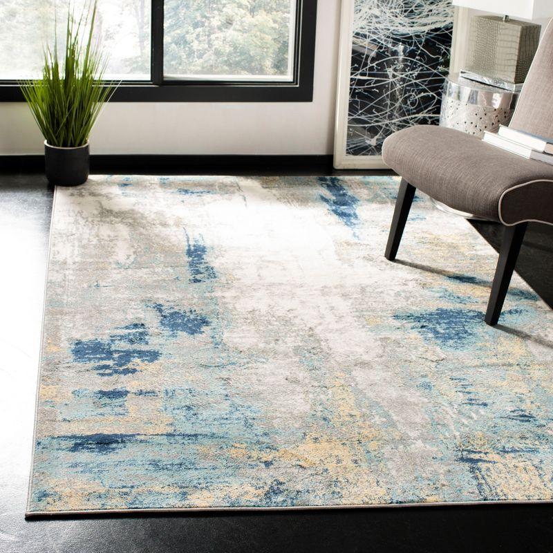 Abstract Grey and Gold Synthetic 3' x 5' Easy-Care Area Rug