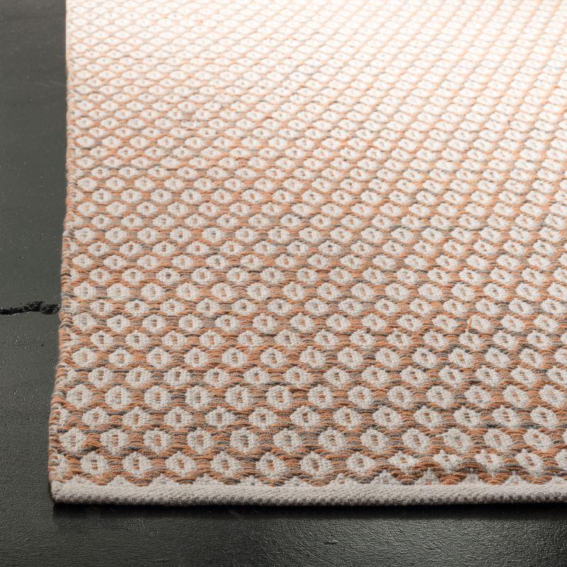 Ivory and Orange Handwoven Cotton Area Rug