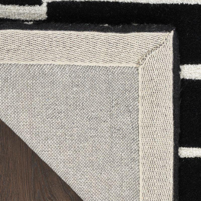 Modern Edge Black Ivory 5' x 7' Hand-Tufted Wool Area Rug