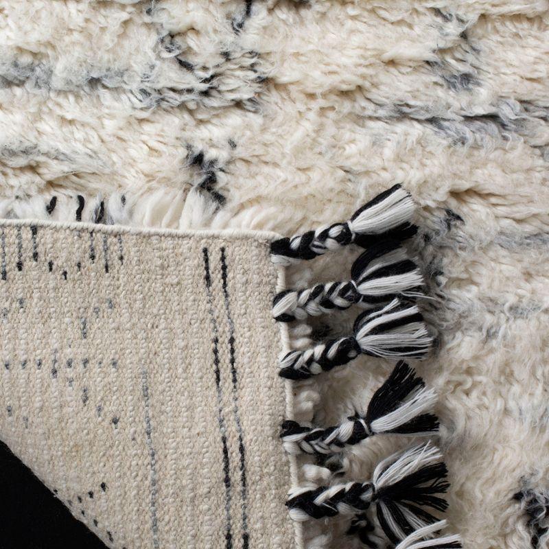 Hand-Knotted Black and Ivory Wool Area Rug with Fringe